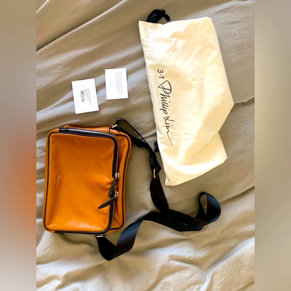 3.1 Phillip Lim Men’s Diego Camera Bag in Cognac. With dust bag and original tag
